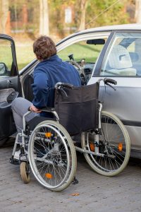 Man in wheelchair driving